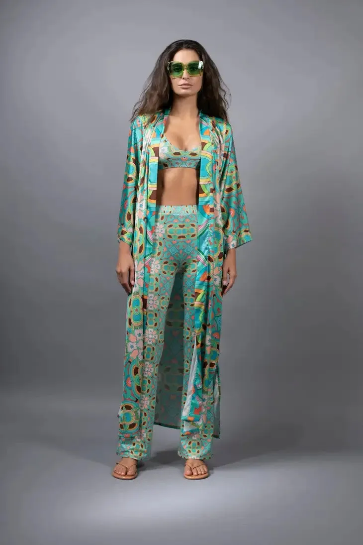 PSYCHEDELIC CROSSES AND STAR TEAL FLARED STRETCH PANTS