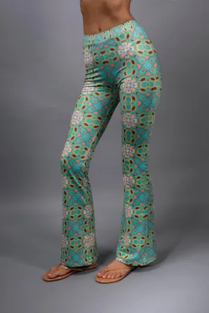PSYCHEDELIC CROSSES AND STAR TEAL FLARED STRETCH PANTS