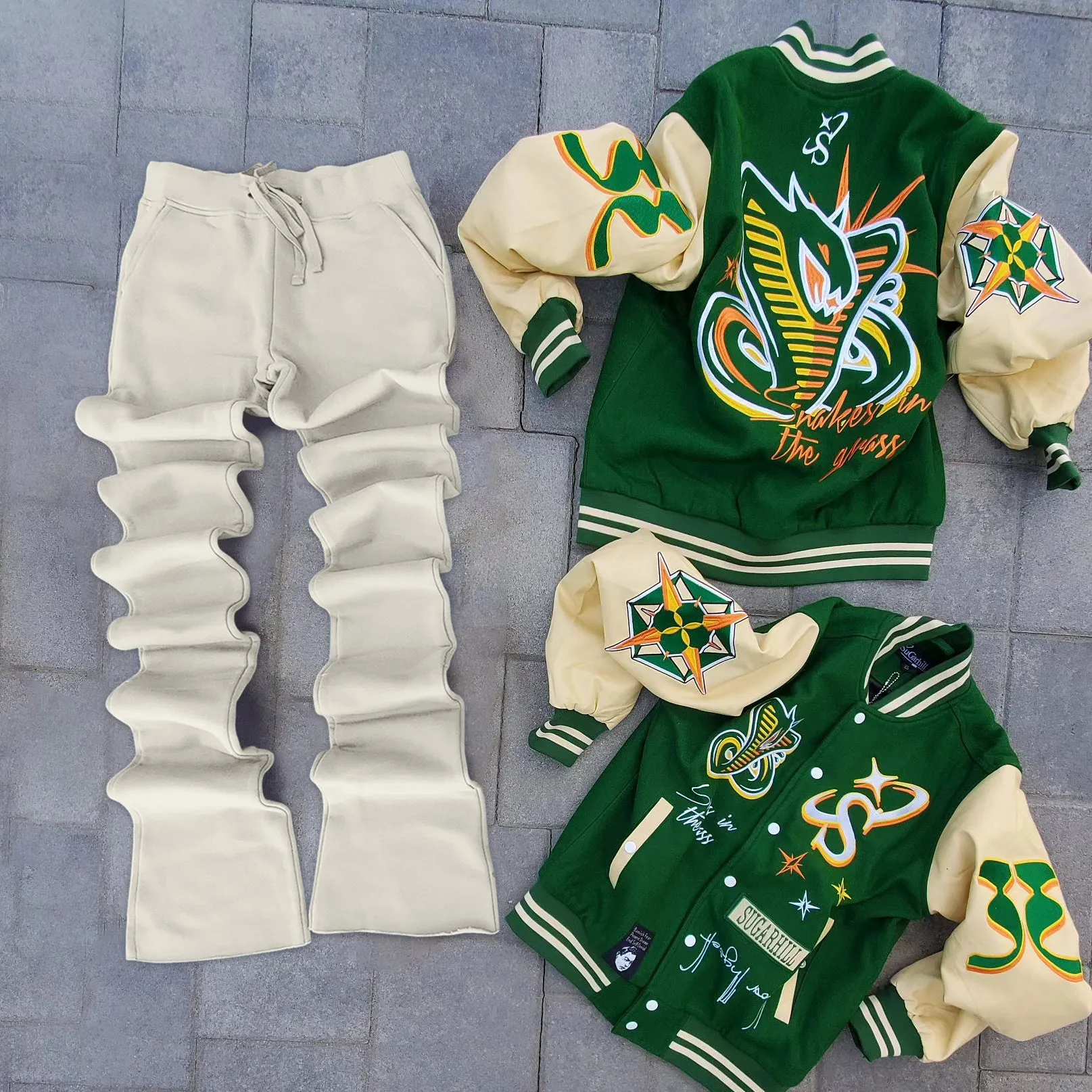 Stylish contrasting color baseball jacket and flared pants suit