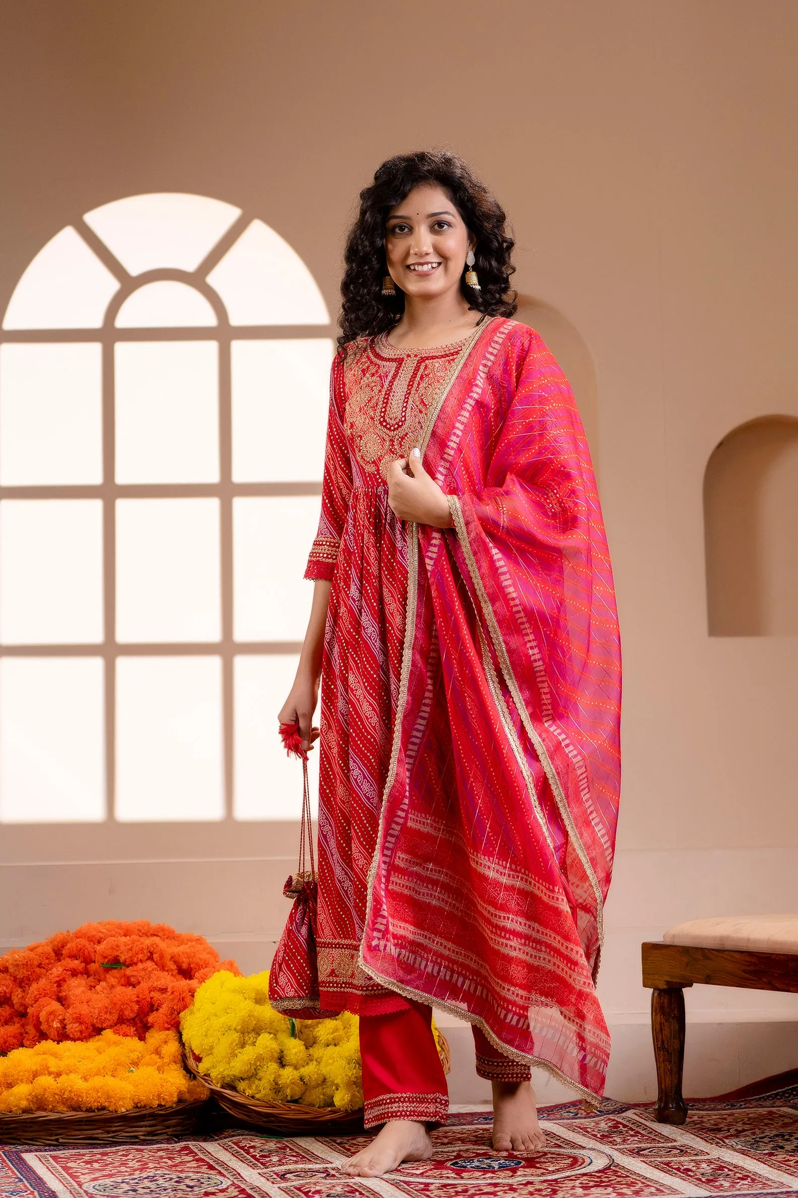 Women's Rayon Red Nyara Cut A-line Kurta, Pant and Dupatta With Fancy Potli Set